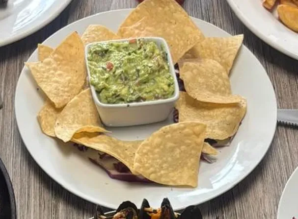 Fresh guacamole with chips